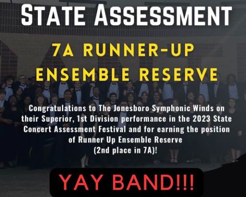  State Assessment 7A Runner-Up Ensemble Reserve - Faded image of band dressed in uniform behind text